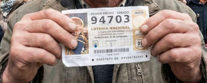 Billete del primer premio de la Lotería Nacional, número 94703, que ha sido consignado en Tarancón (Cuenca), repartiendo un total de 1.300.000 euros por número.